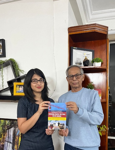 Presenting “Beyond the Blueprint” to Ms. Tania Banerjee — photograph 1